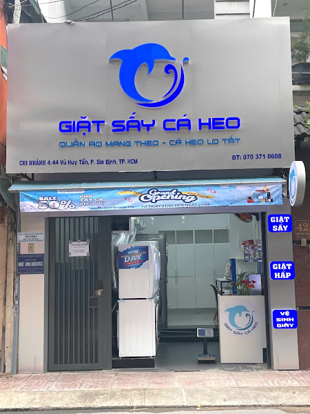 Giặt Sấy Cá Heo Vũ Huy Tấn